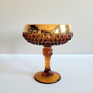 Vintage amber Indiana glass 1970s footed compote with gold trim.